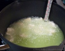 Frying in grapeseed oil (hence the green color)
