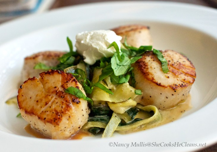 Scallops with zucchini ribbons and goat cheese